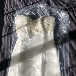 Wore once for my wedding. Small size